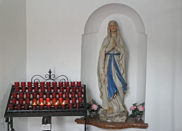 Lighting candles in front of a statue of Mary is idolatry!